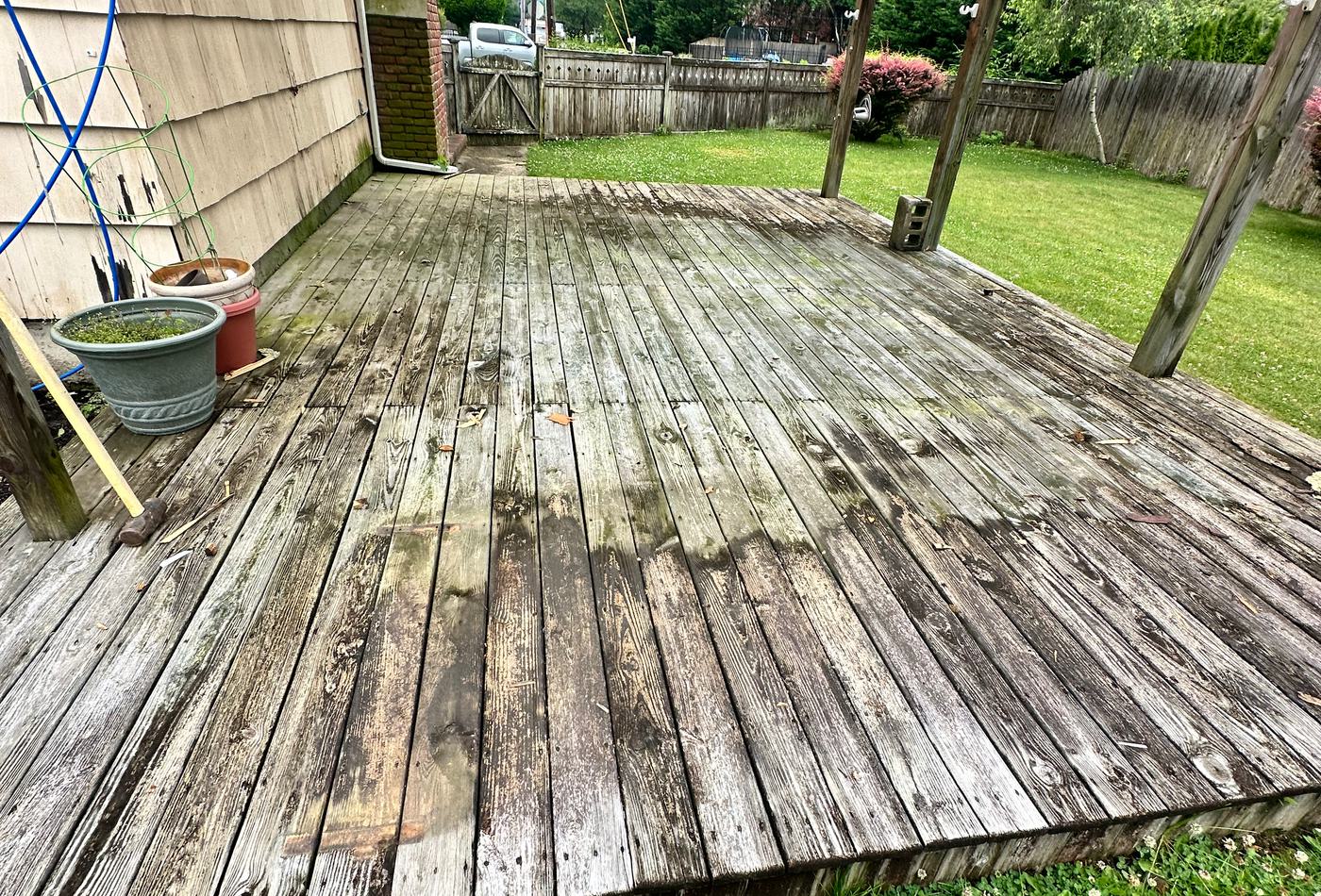 Weathered gray deck before cleaning