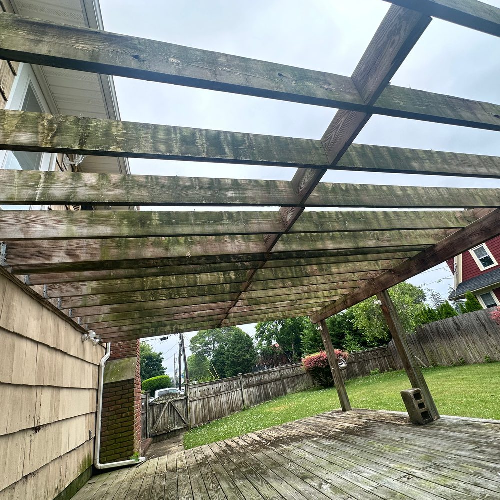 Weathered pergola and deck before cleaning