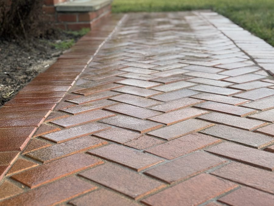 Wet brick walkway after cleaning