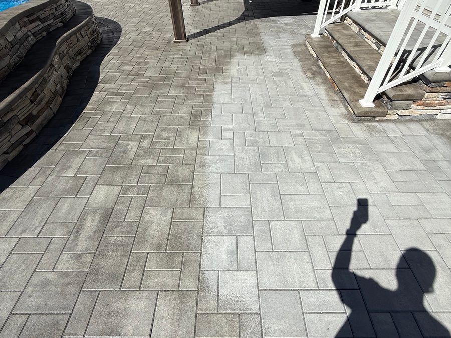 Sealed paver patio by a pool